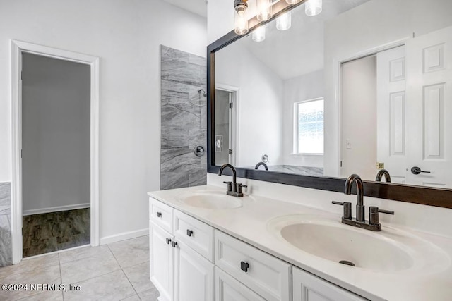 bathroom with vanity and tile patterned flooring