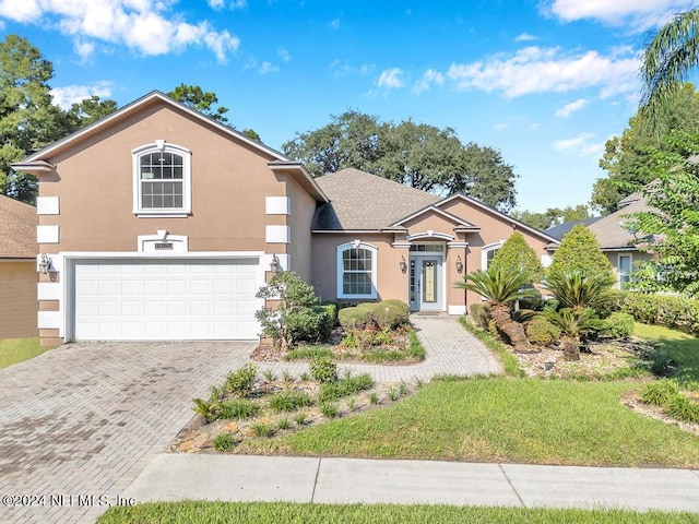 view of front property with a garage