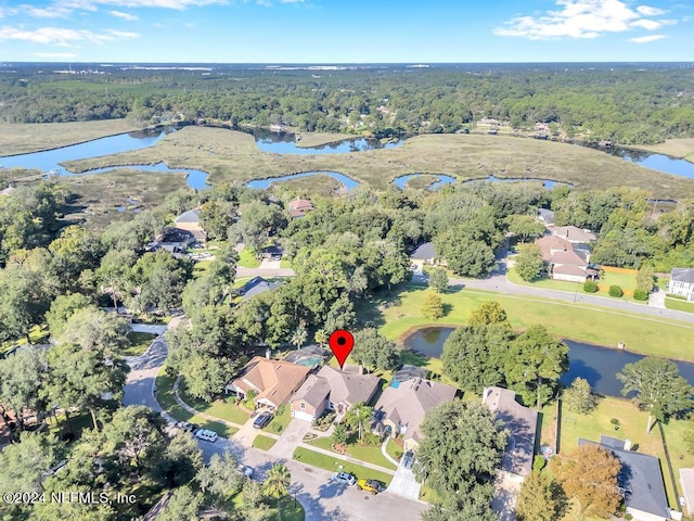 birds eye view of property featuring a water view