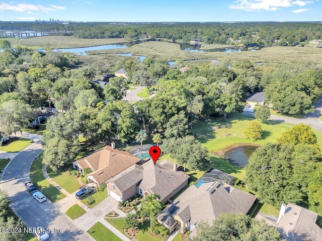 birds eye view of property featuring a water view