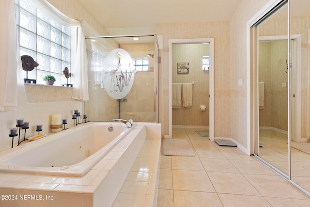 bathroom with plus walk in shower and tile patterned floors