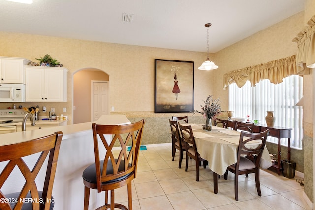 view of tiled dining space