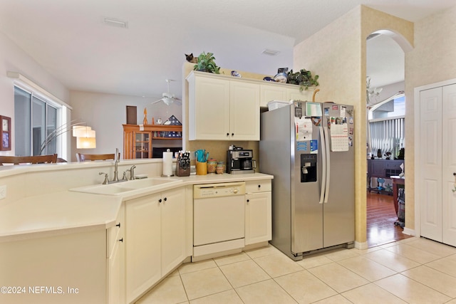 kitchen with ceiling fan, light tile patterned floors, sink, stainless steel fridge with ice dispenser, and dishwasher