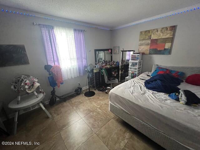 bedroom with a textured ceiling