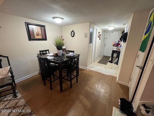 dining area featuring wood-type flooring