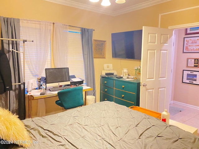 bedroom with tile patterned floors and ornamental molding