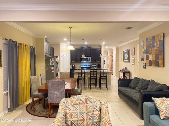 living room with light tile patterned floors and crown molding