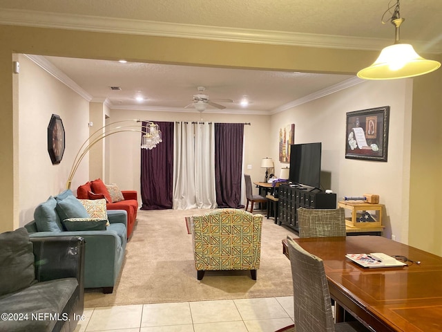 living room with light carpet, a textured ceiling, ceiling fan, and crown molding