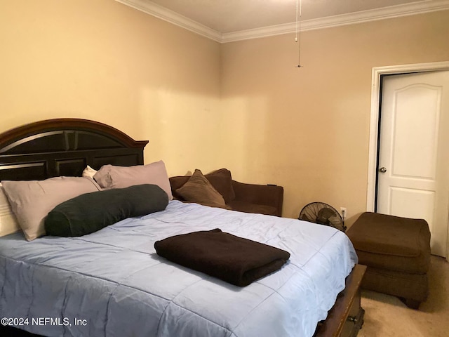 carpeted bedroom with crown molding