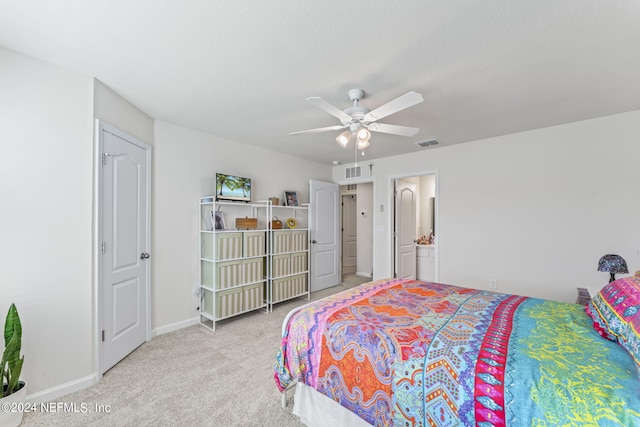 bedroom featuring ceiling fan and light carpet