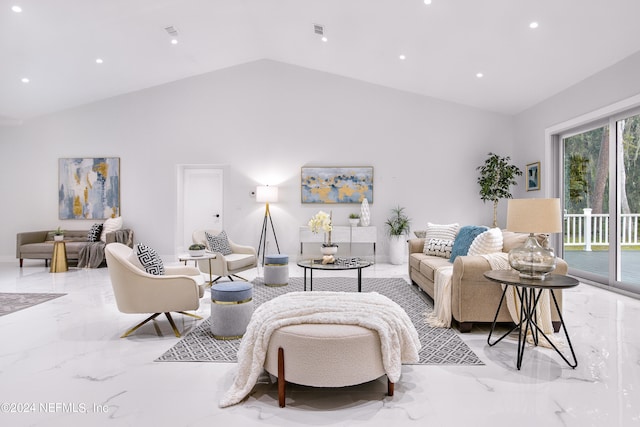 living room featuring vaulted ceiling