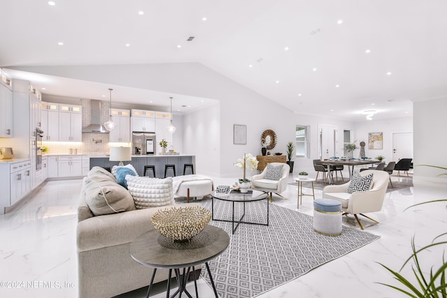 living room featuring vaulted ceiling