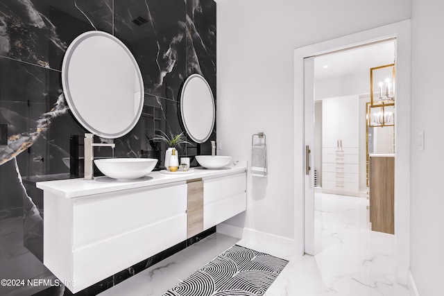 bathroom with tile walls and vanity