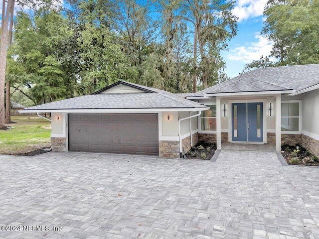 view of front of property featuring a garage