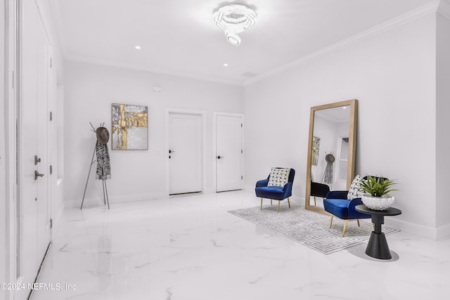 sitting room featuring crown molding