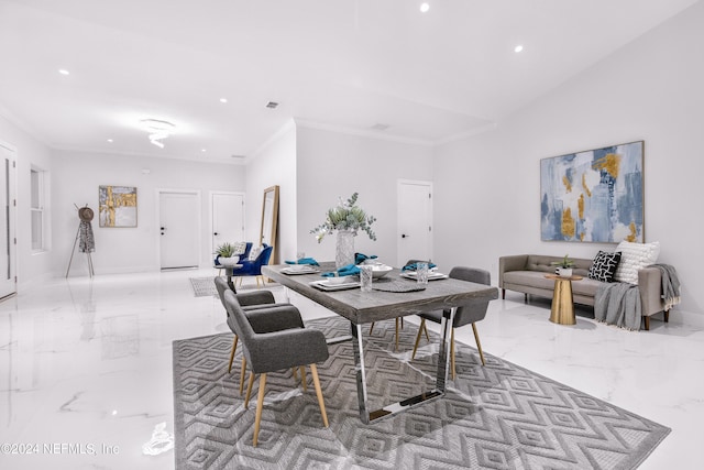 dining area featuring ornamental molding