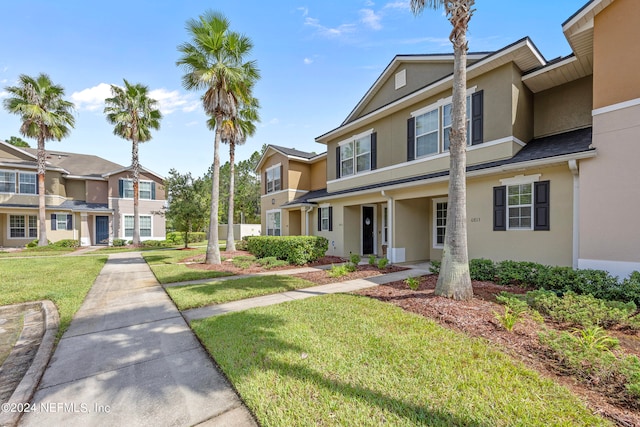 view of front of property with a front lawn