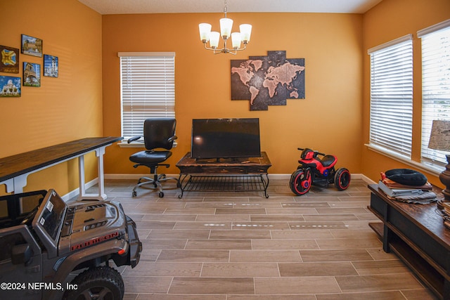 home office with an inviting chandelier