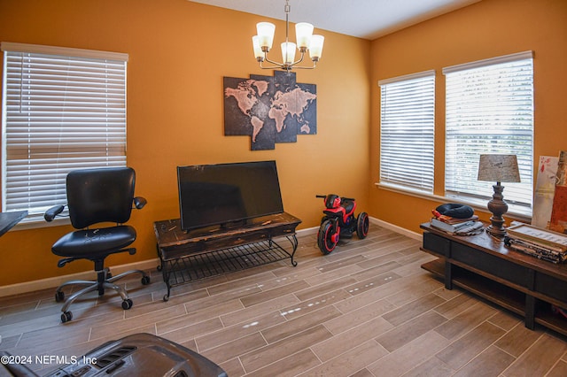 interior space featuring a chandelier and hardwood / wood-style flooring