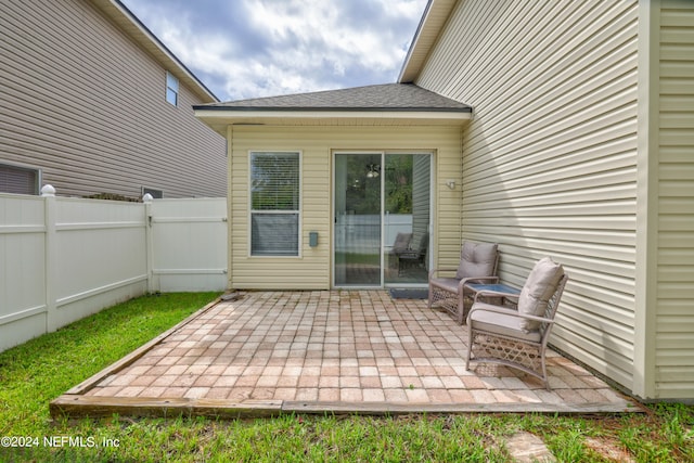 back of house with a patio area