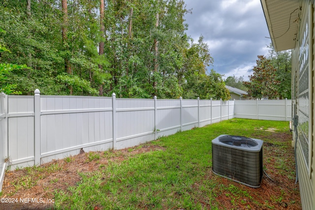 view of yard featuring central AC unit