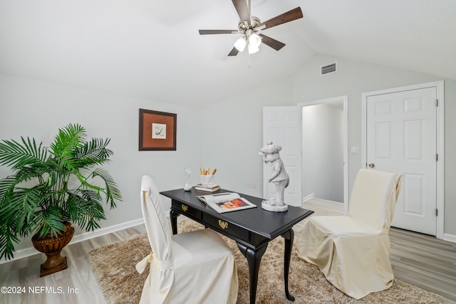 office area with vaulted ceiling, ceiling fan, and hardwood / wood-style flooring