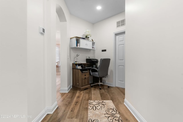 office space with hardwood / wood-style floors