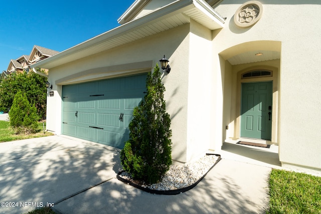 view of side of home with a garage