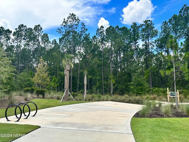 view of community featuring a lawn