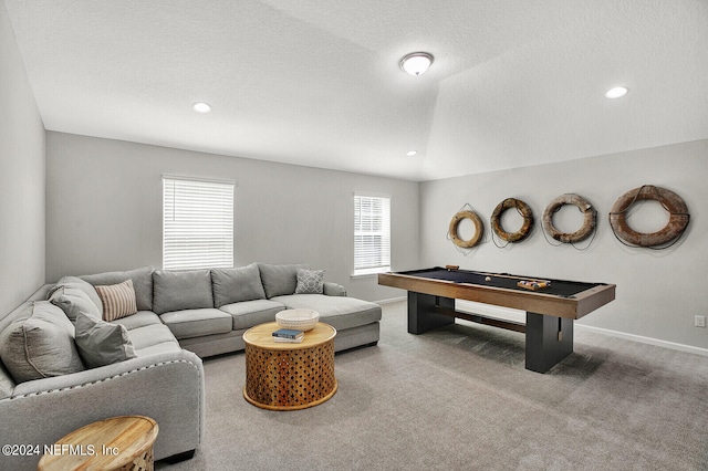 recreation room featuring pool table, carpet, a textured ceiling, and vaulted ceiling