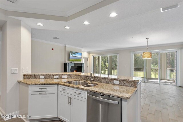 kitchen featuring crown molding, white cabinetry, sink, dishwasher, and light hardwood / wood-style flooring