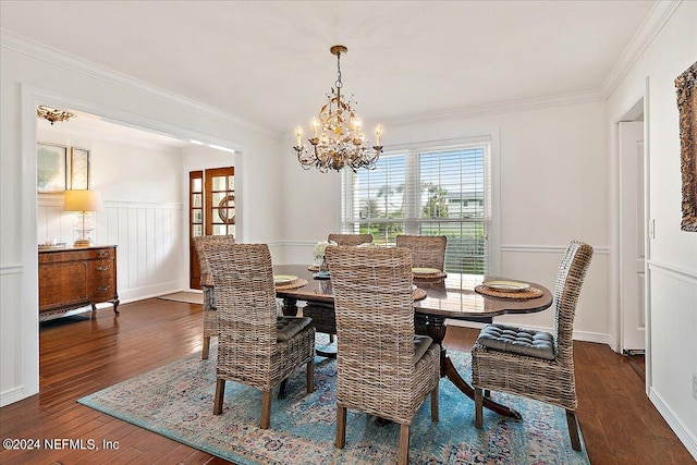 dining area with a chandelier, crown molding, and dark hardwood / wood-style flooring