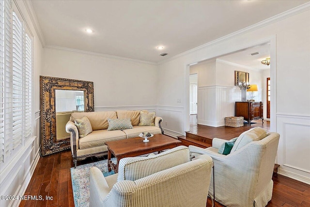 living room featuring dark hardwood / wood-style floors and ornamental molding