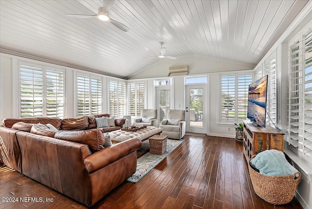 living room featuring lofted ceiling, ceiling fan, a healthy amount of sunlight, and dark hardwood / wood-style flooring