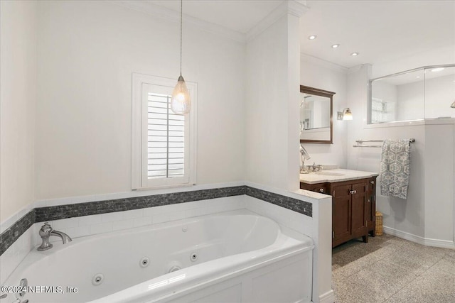 bathroom featuring a bathtub, ornamental molding, and vanity