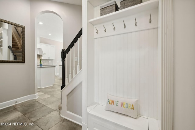 mudroom with tile patterned flooring