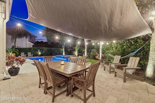 view of patio / terrace featuring a fenced in pool