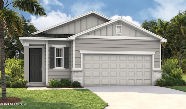 view of front of home with a front lawn and a garage