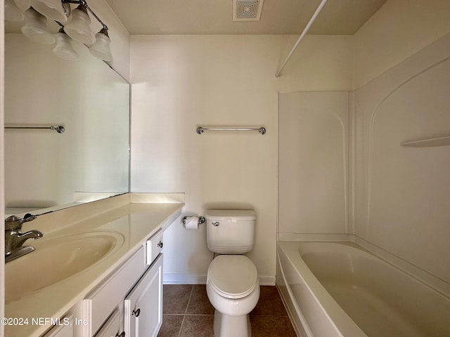 full bathroom with bathtub / shower combination, tile patterned floors, vanity, and toilet