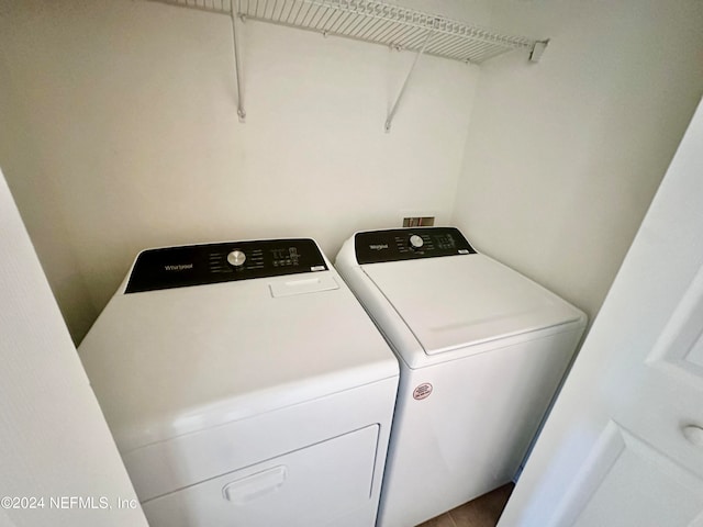 laundry room with washer and clothes dryer