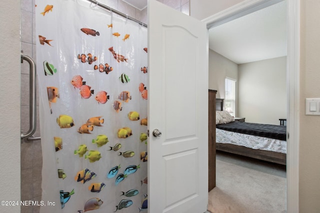 bathroom featuring a shower with curtain