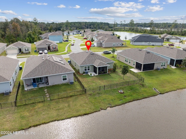 drone / aerial view with a water view