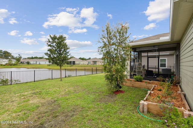 view of yard with a water view