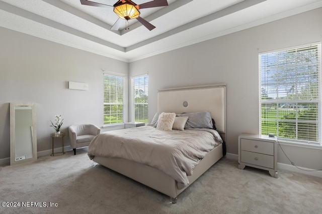 bedroom featuring carpet floors, crown molding, multiple windows, and ceiling fan