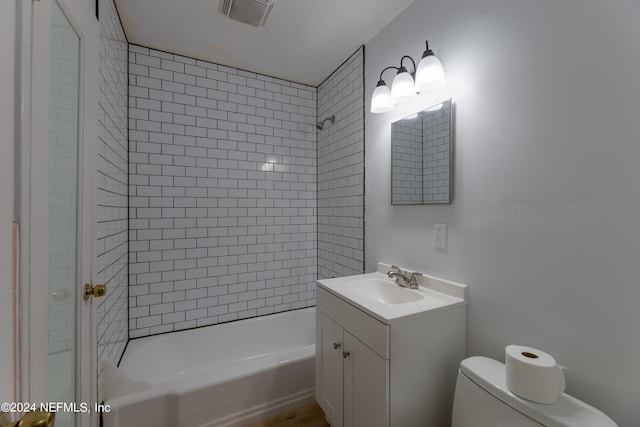 1340 W 11th St, Jacksonville, FL 32209 - bathroom featuring shower / bathing tub combination, visible vents, toilet, and vanity