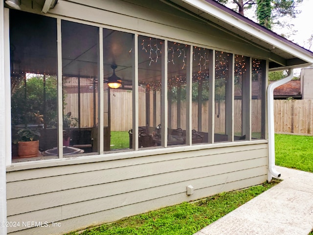 view of home's exterior featuring a sunroom