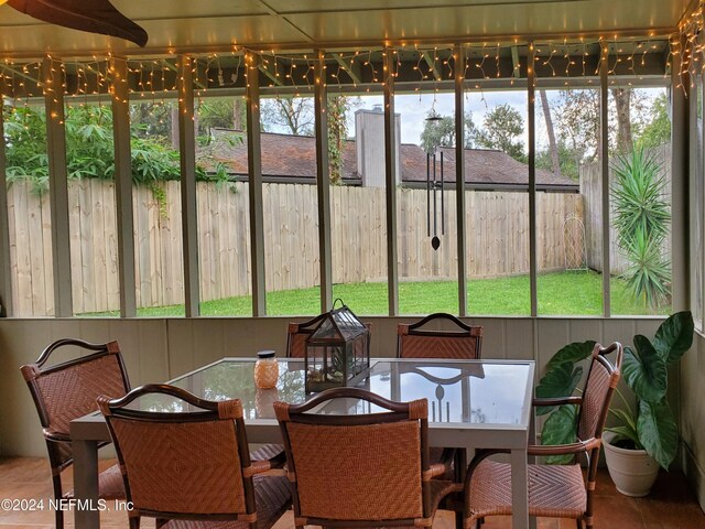 sunroom / solarium with a healthy amount of sunlight