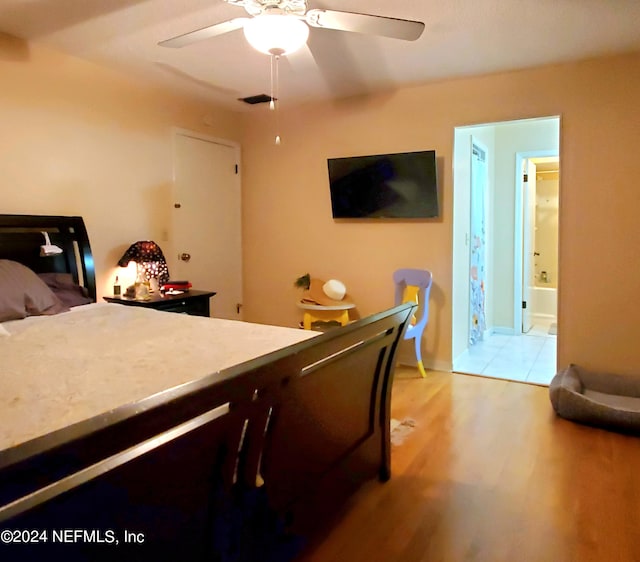 bedroom with light wood-type flooring and ceiling fan