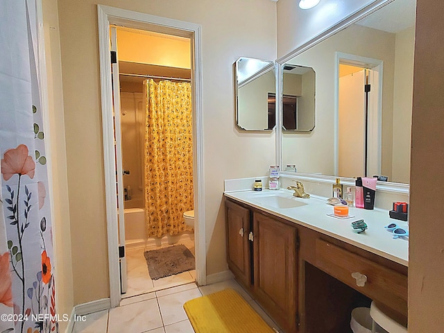 full bathroom featuring shower / bathtub combination with curtain, tile patterned flooring, vanity, and toilet