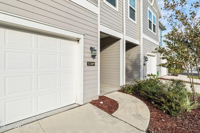 entrance to property with a garage